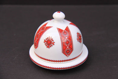 small round covered butter dish